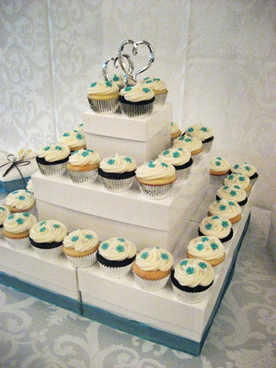 An easy and affordable way to create a tiered wedding cupcake display stand