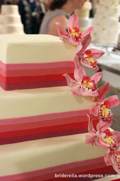 Bright pinks and ochid details makes this a perfect destination wedding cake