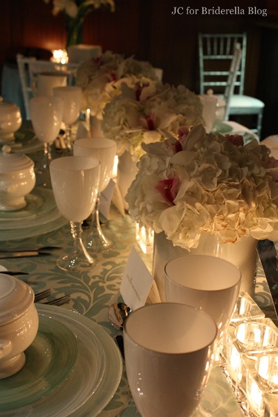 A white green table setting from Exclusive Affair Rentals