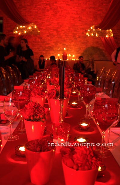 A modern red and white table setting