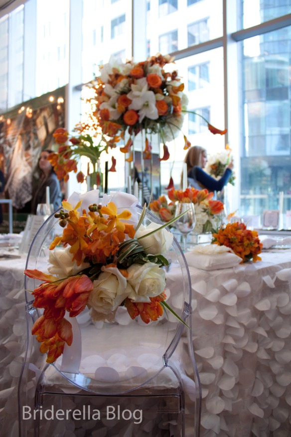 Modern orange and white table setting from Underwraps Decor Special Events